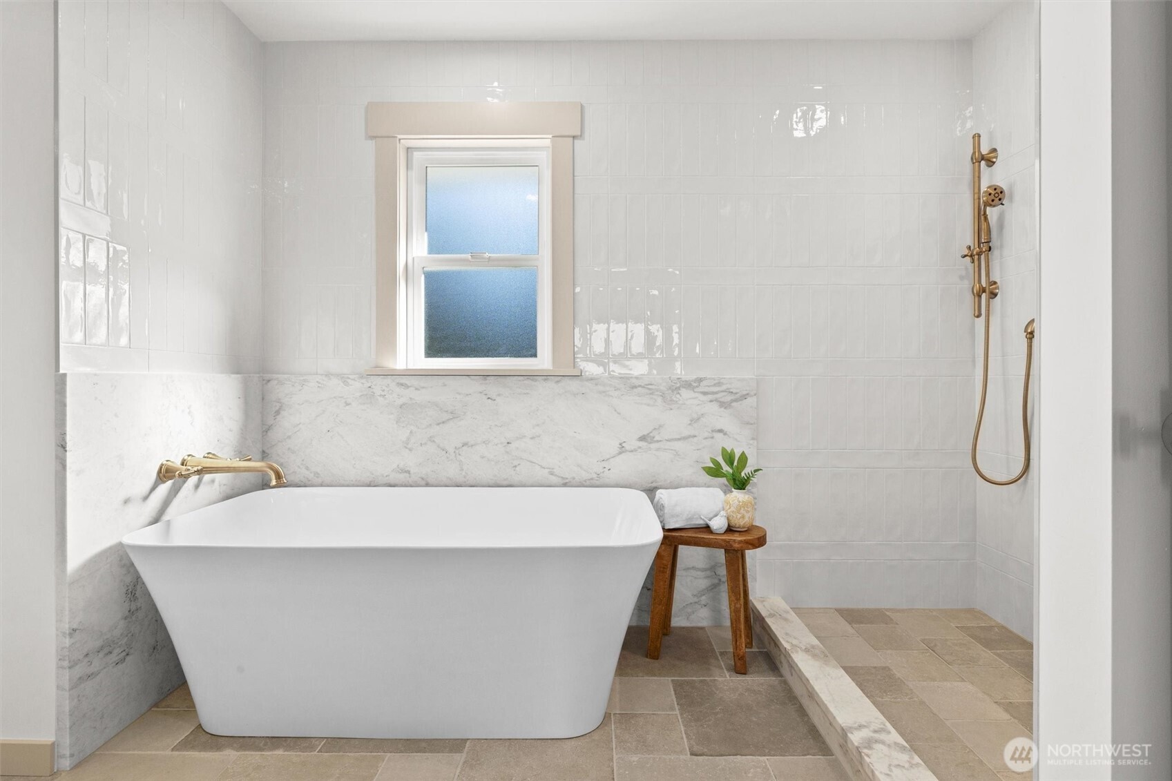 9813 Moran Road Arlington, WA 98223 - Photo 23 of 40 a white bath tub sitting in a bathroom