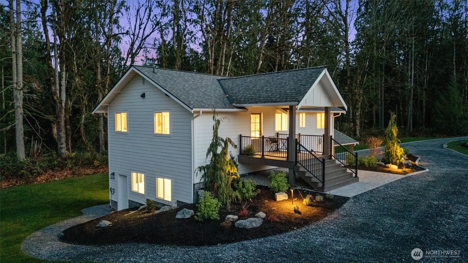 9813 Moran Road Arlington, WA 98223 - Photo 35 of 40 a front view of a house with yard and green space