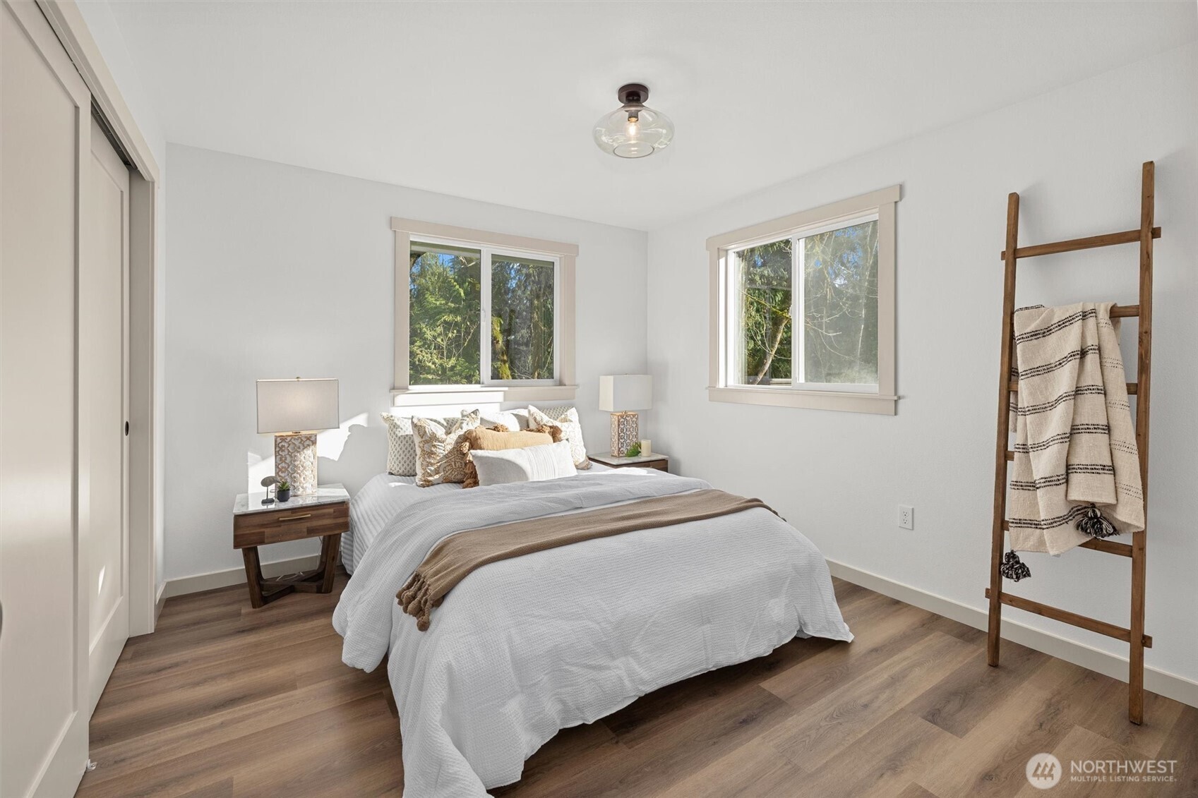 9813 Moran Road Arlington, WA 98223 - Photo 40 of 40 a bedroom with a bed and a window