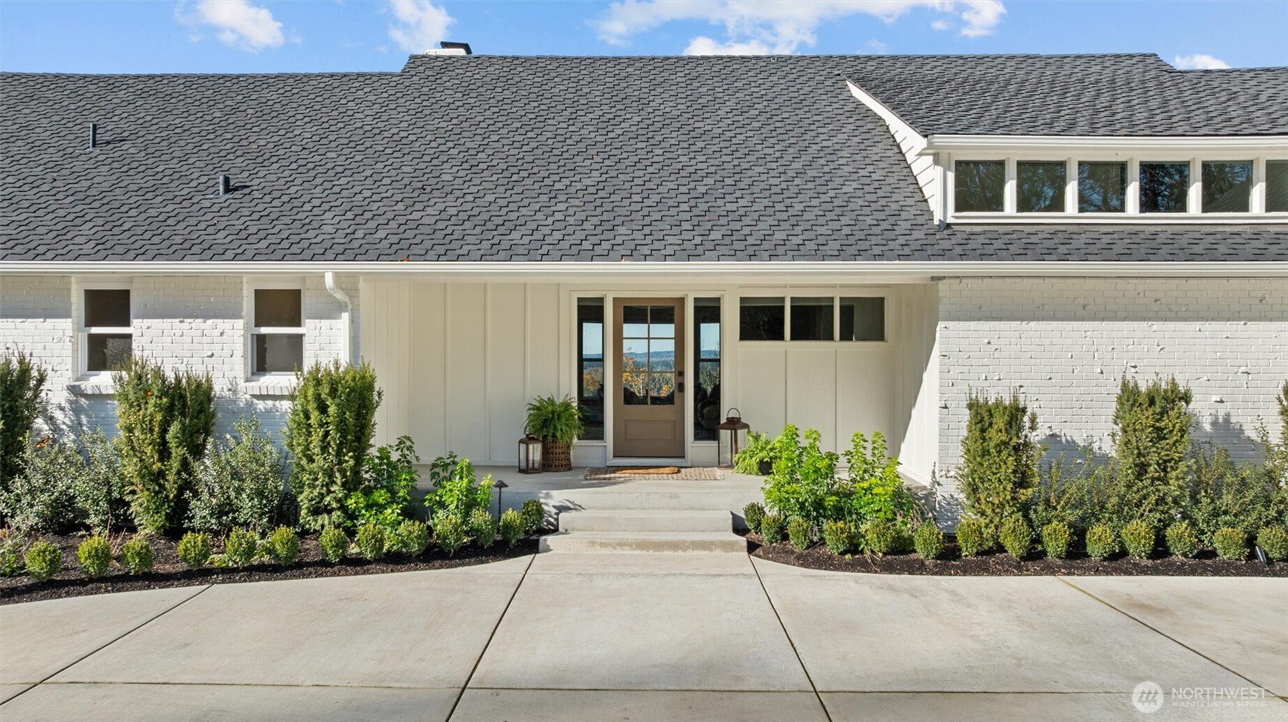 9813 Moran Road Arlington, WA 98223 - Photo 9 of 40 a front view of a house with garden