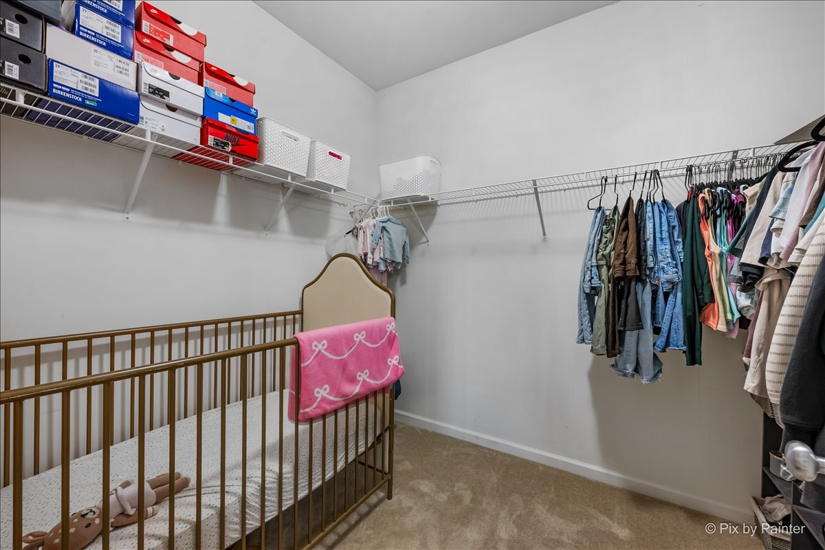 691 Windett Ridge Road Yorkville, IL 60560 - Photo 21 of 42 a view of a walk in closet