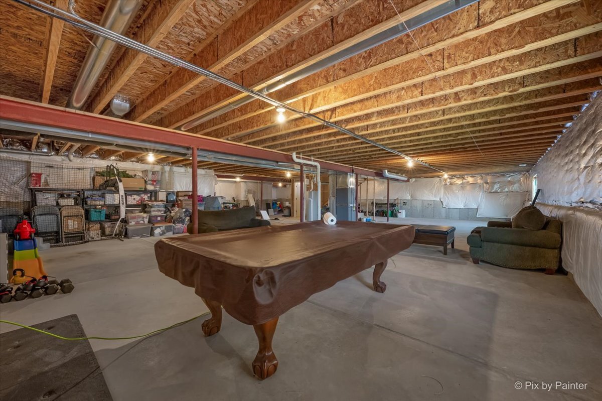 691 Windett Ridge Road Yorkville, IL 60560 - Photo 30 of 42 a view of a gym with wooden floor
