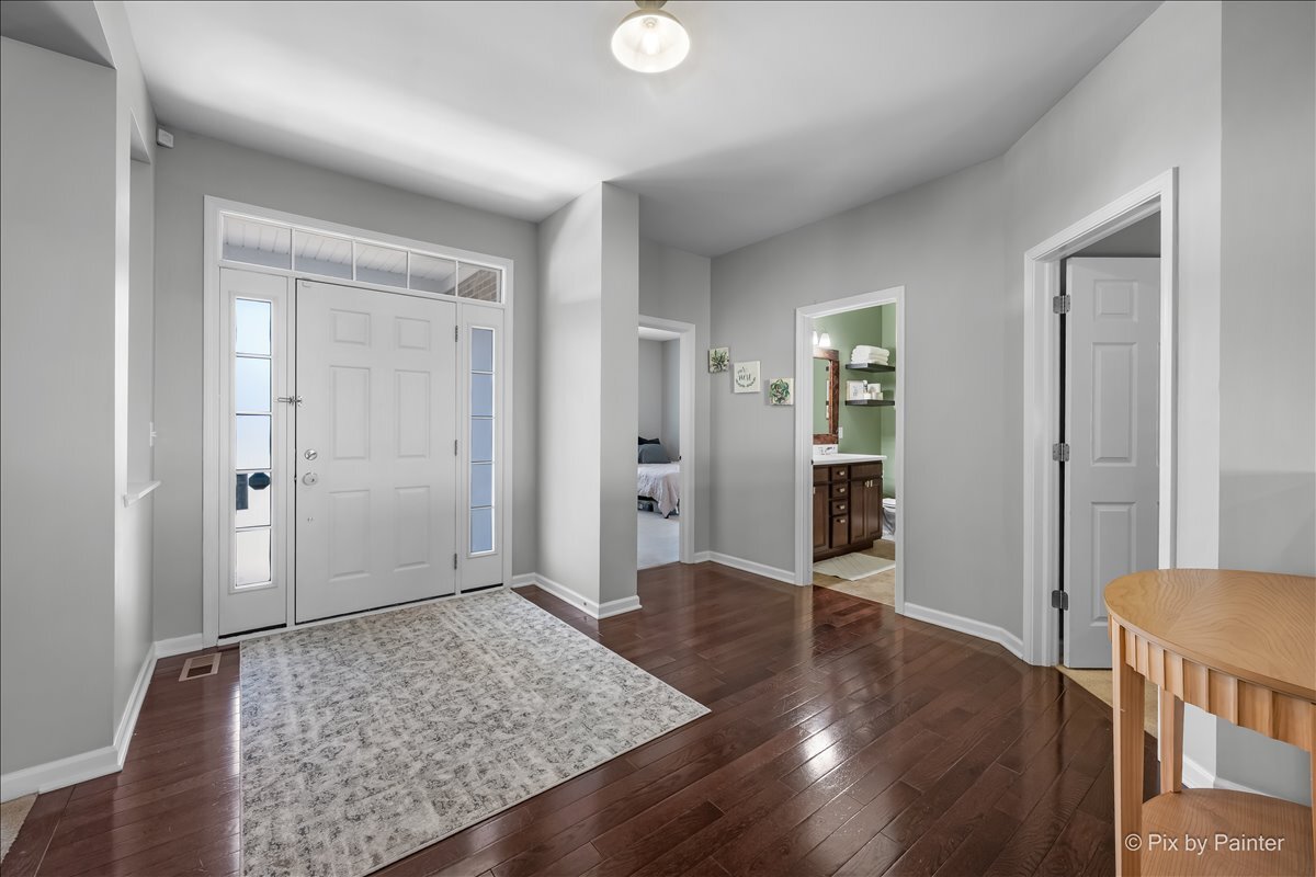 691 Windett Ridge Road Yorkville, IL 60560 - Photo 4 of 42 a view of livingroom with wooden floor