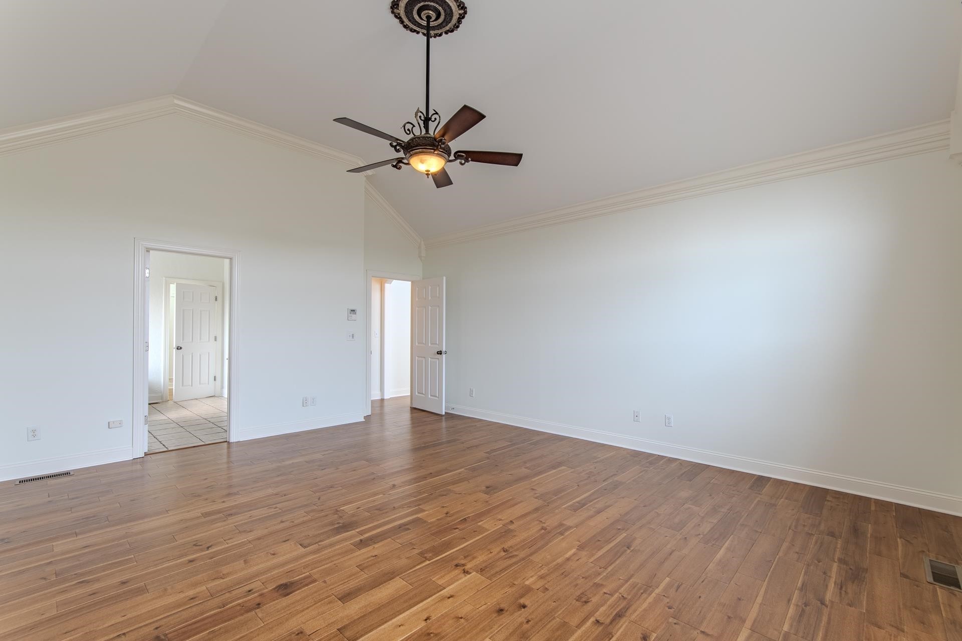 5166 Middlefork Road Luray, TN 38352 - Photo 18 of 40 a view of an empty room and chandelier fan