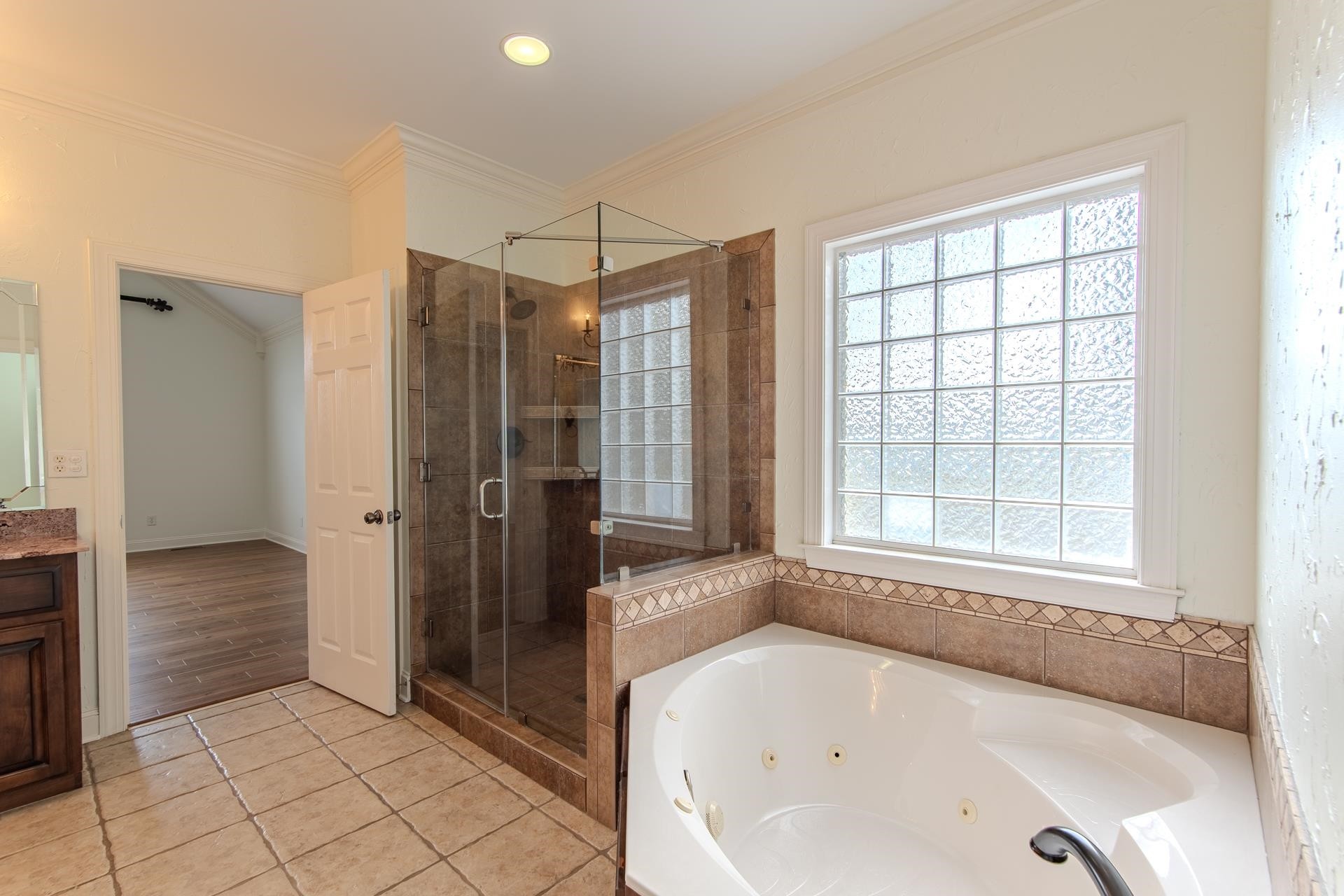 5166 Middlefork Road Luray, TN 38352 - Photo 21 of 40 a bathroom with a bathtub and a shower