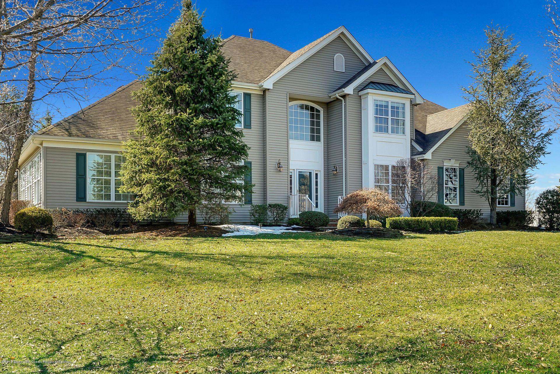 263 Pin Oak Road Freehold, NJ 07728 - Photo 1 of 60 a view of a house with a patio and a yard