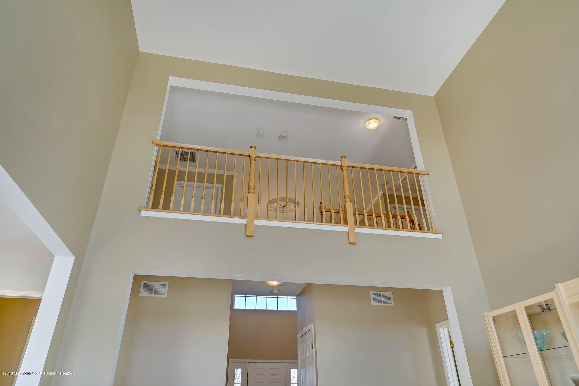 263 Pin Oak Road Freehold, NJ 07728 - Photo 30 of 60 a view of a hallway with front door