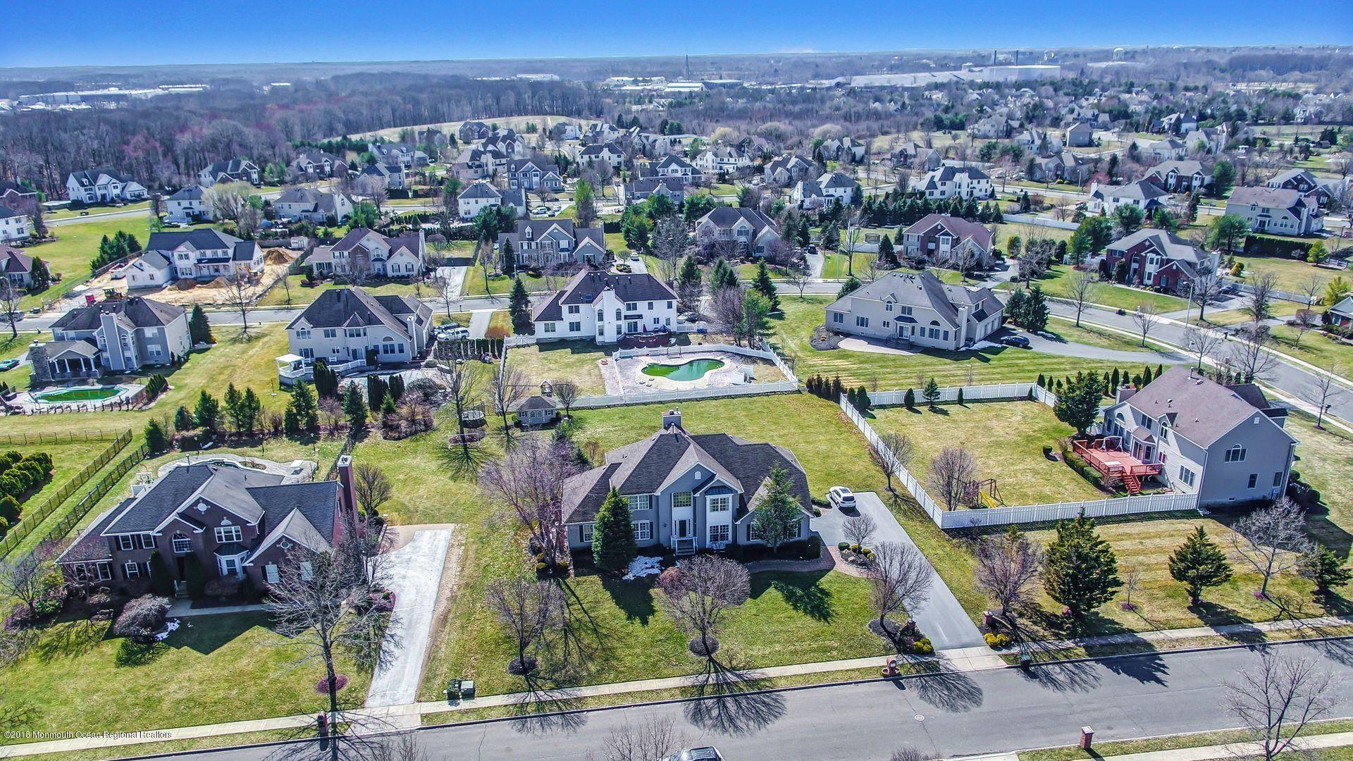 263 Pin Oak Road Freehold, NJ 07728 - Photo 55 of 60 an aerial view of a houses with a swimming pool