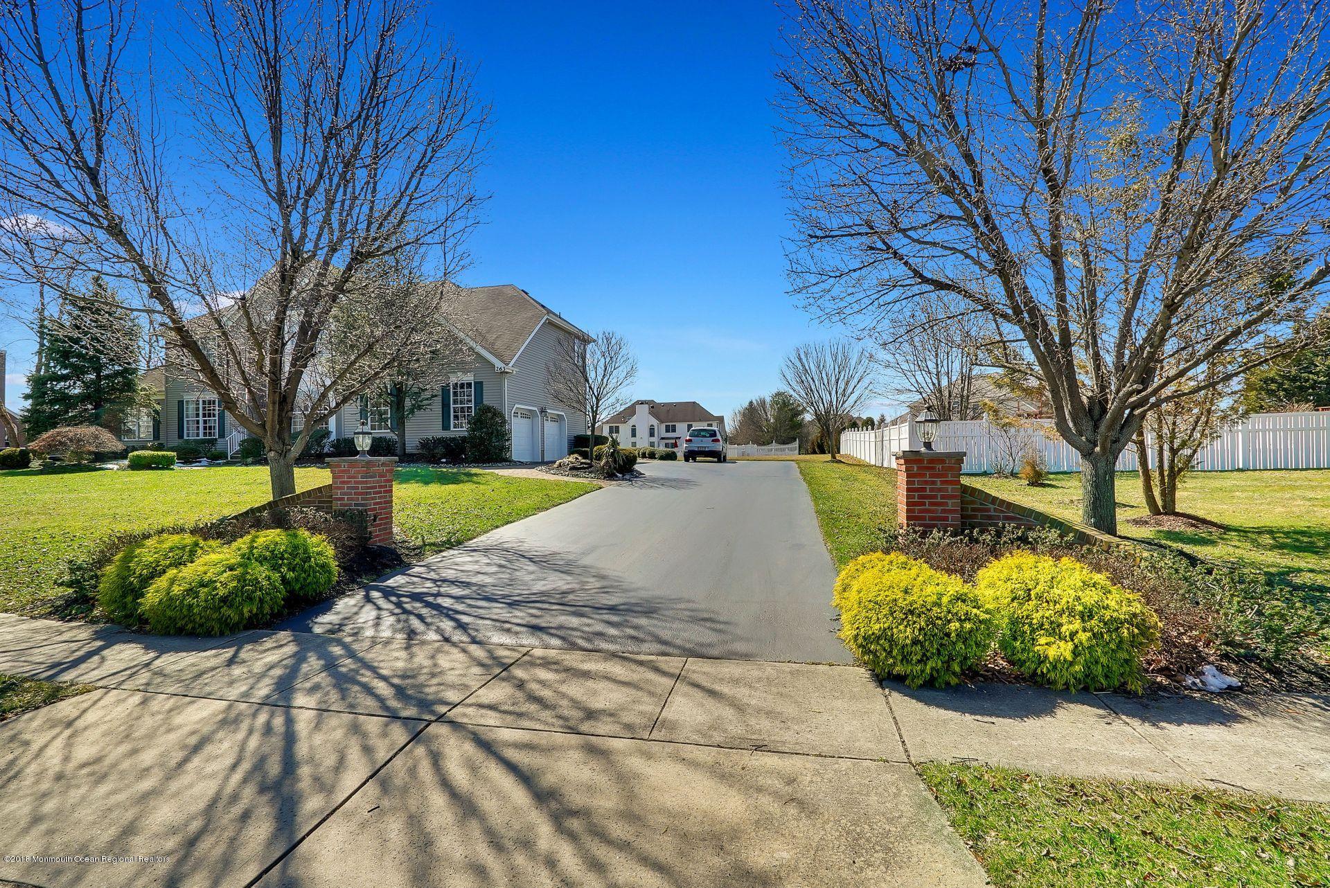 263 Pin Oak Road Freehold, NJ 07728 - Photo 7 of 60 a street view with large trees