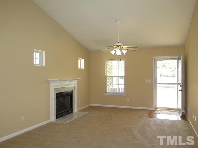 9136 Shallcross Way Raleigh, NC 27617 - Photo 2 of 13 a view of livingroom with window