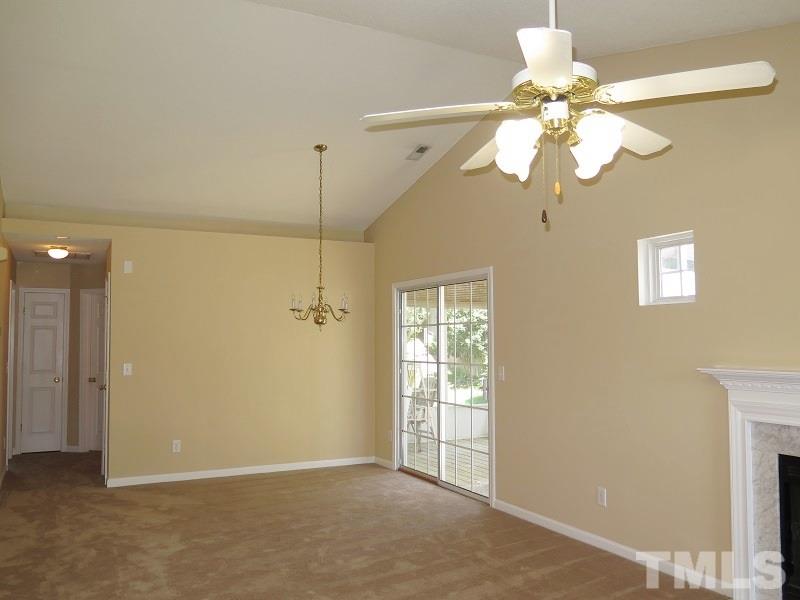 9136 Shallcross Way Raleigh, NC 27617 - Photo 5 of 13 en view of a chandelier fan and a chandelier fan in a room