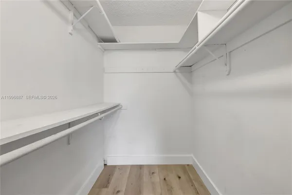 a view of small space with racks on the wall