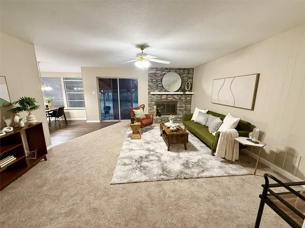 a living room with furniture gym equipment and a view of living room