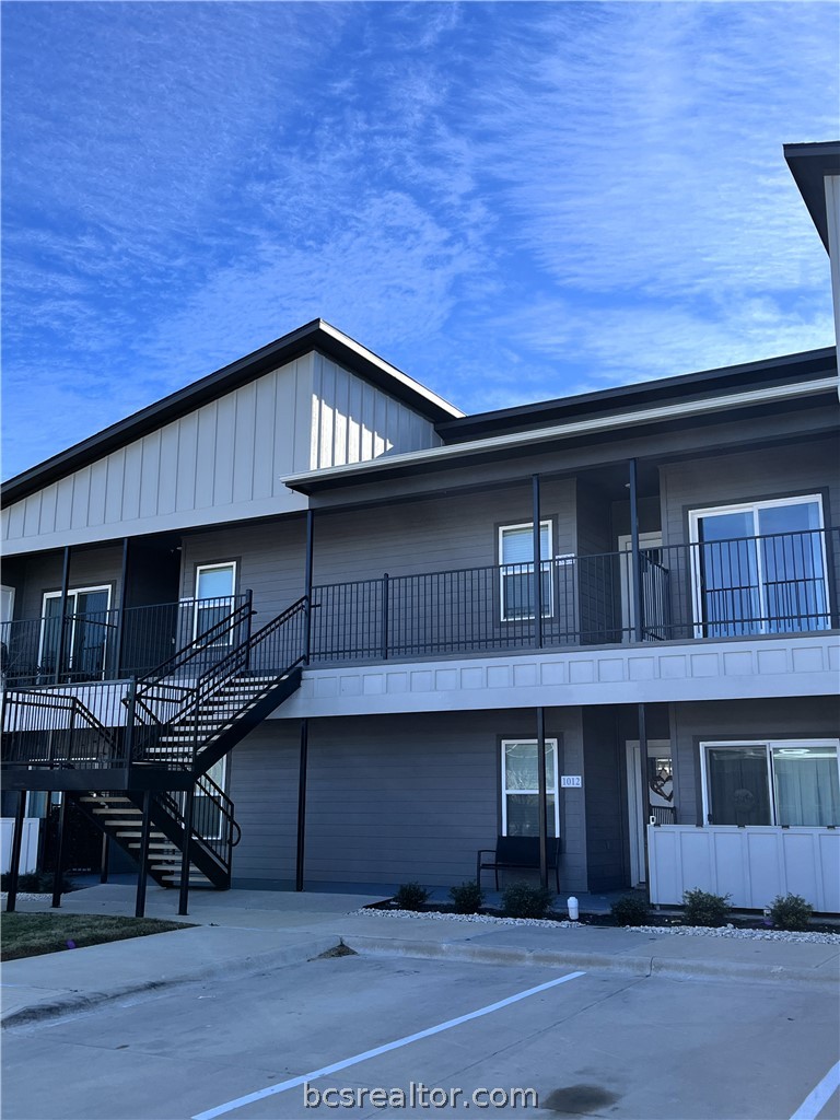1326 Prairie Drive, Unit 1021 Bryan, TX 77803 - Photo 1 of 17 a view of a house with a patio