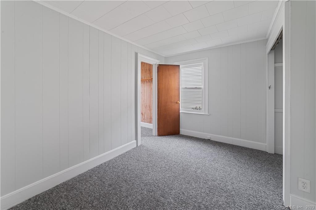 71 Chambers Street, Unit 1 3 Waterbury, CT 06708 - Photo 1 of 1 a view of an empty room and closet area