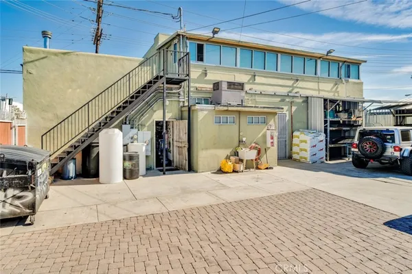 a view of a building with a patio