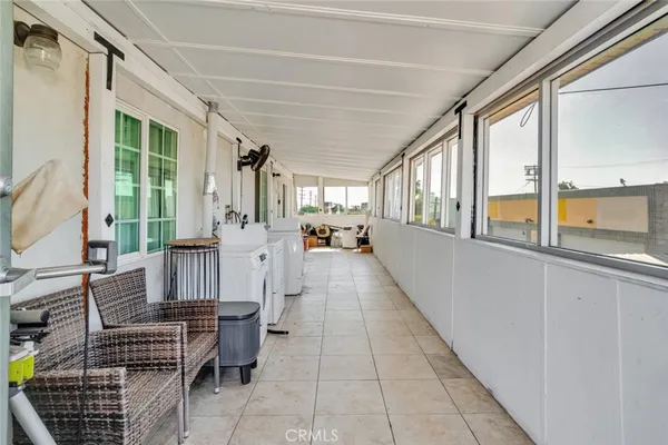 a bedroom with a bed and a table