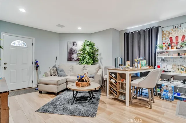 a kitchen with stainless steel appliances granite countertop a stove and cabinets