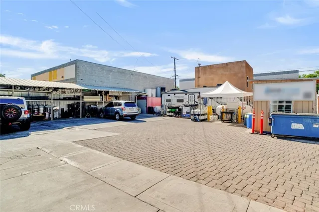 a view of city with the shops and fruits market