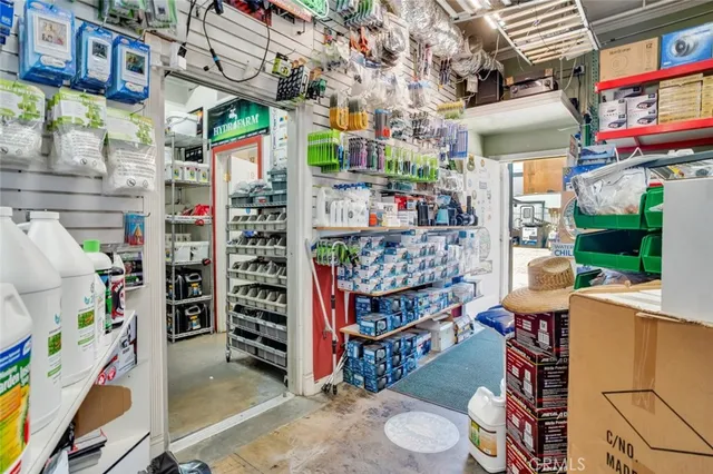 a view of path along with retail shop and buildings