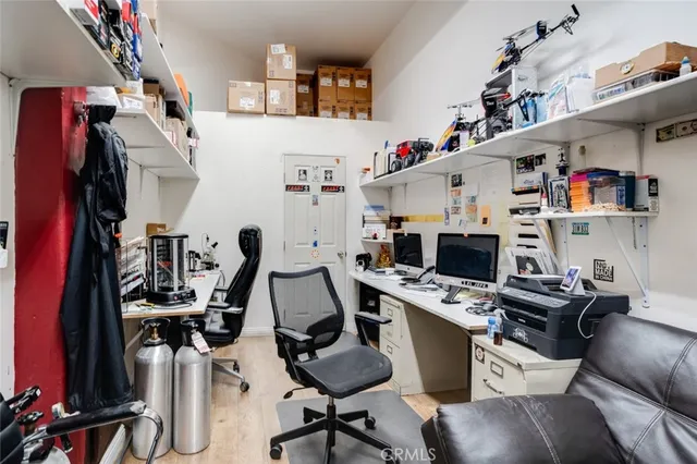 a lobby with furniture and floor to ceiling window