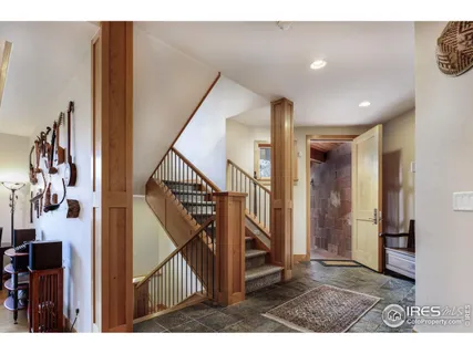 a bedroom with a bed and a fireplace