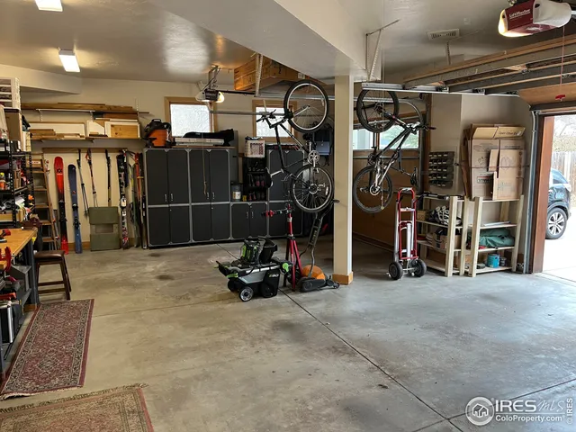 a backyard of a house with large tree