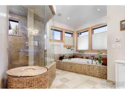 a bathroom with a granite countertop sink mirror and a