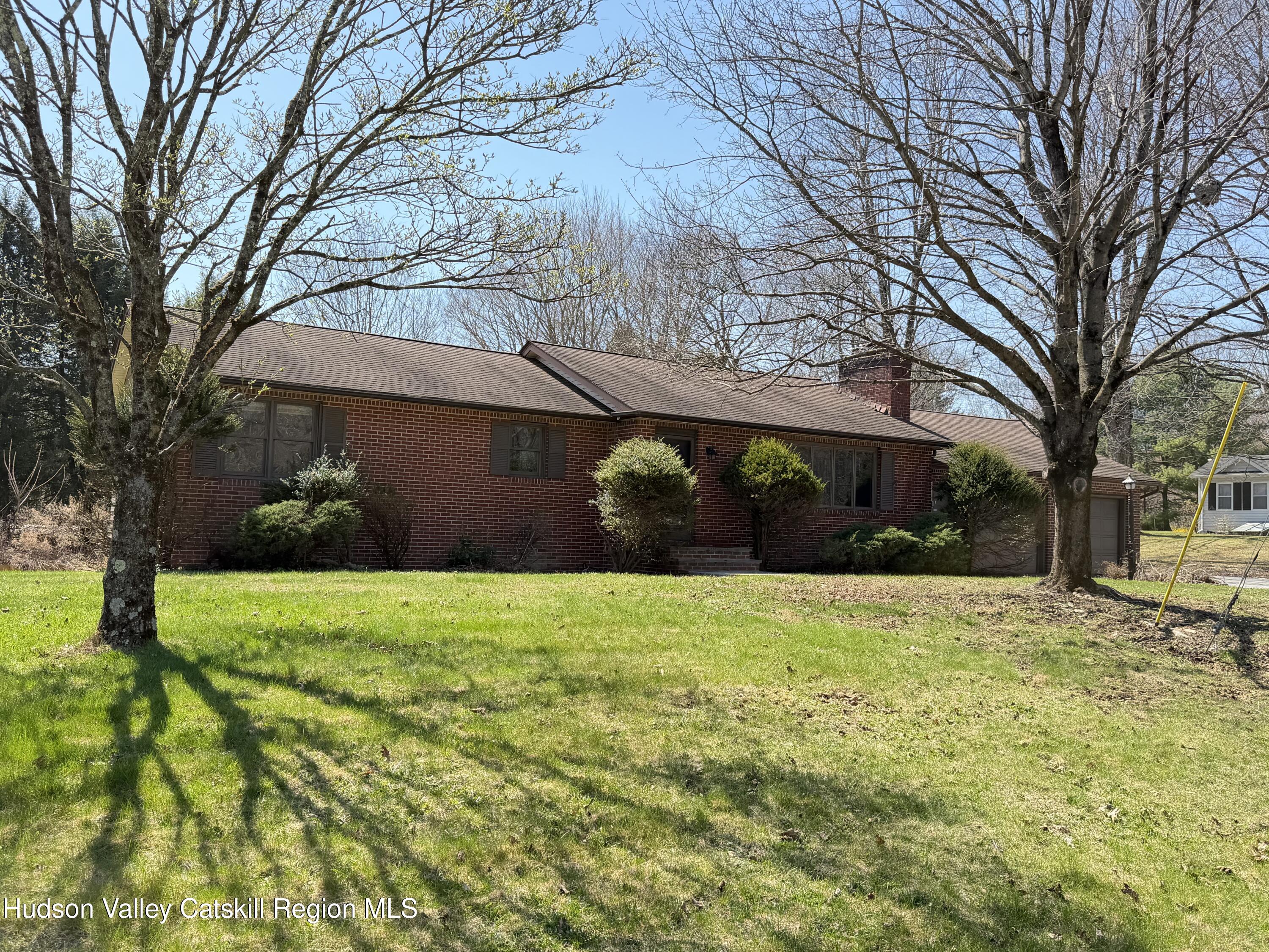a view of a back yard of the house
