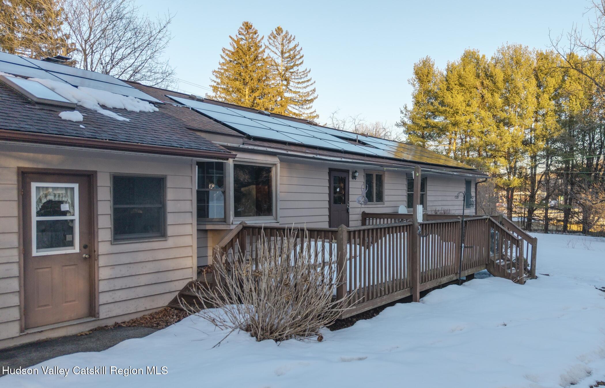 609 New Paltz Road Highland, NY 12528 - Photo 28 of 35 a view of a house with a backyard and wooden fence