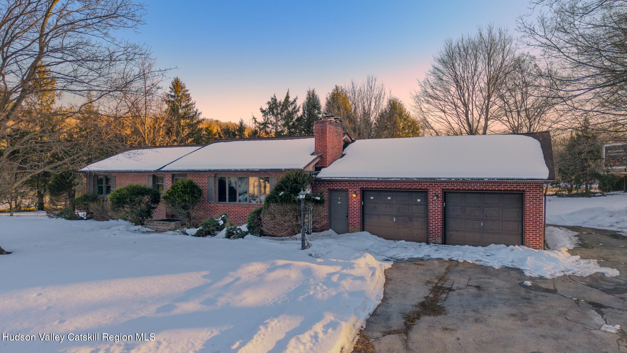 609 New Paltz Road Highland, NY 12528 - Photo 31 of 35 a view of a house with a yard and sitting area