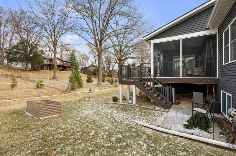 4418 Chestnut Drive Bettendorf, IA 52722 - Photo 45 of 45 a house with trees in front of it