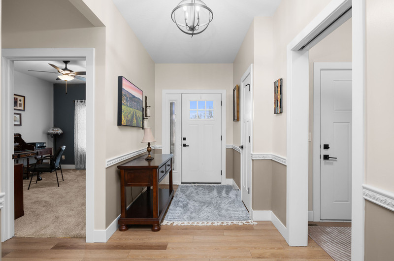 4418 Chestnut Drive Bettendorf, IA 52722 - Photo 7 of 45 a view of livingroom with furniture and a fireplace