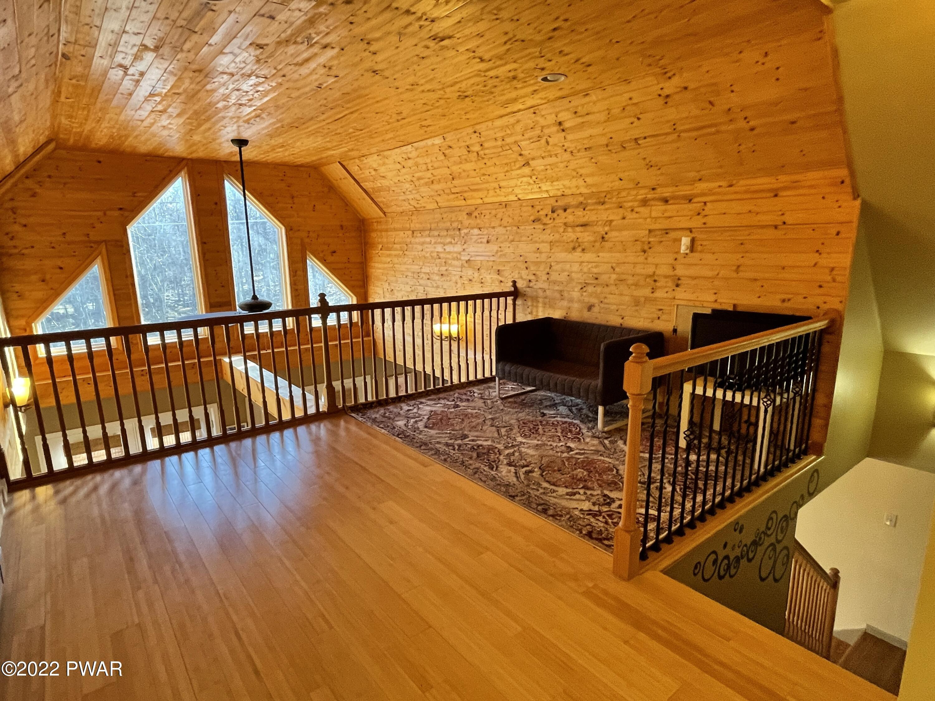 119 Johnson Road Milford, PA 18337 - Photo 27 of 46 Sitting area overlooking living area