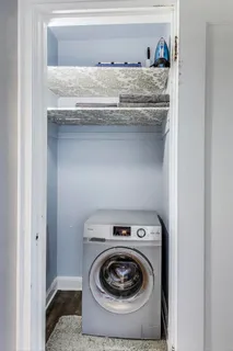 a utility room with washer and dryer
