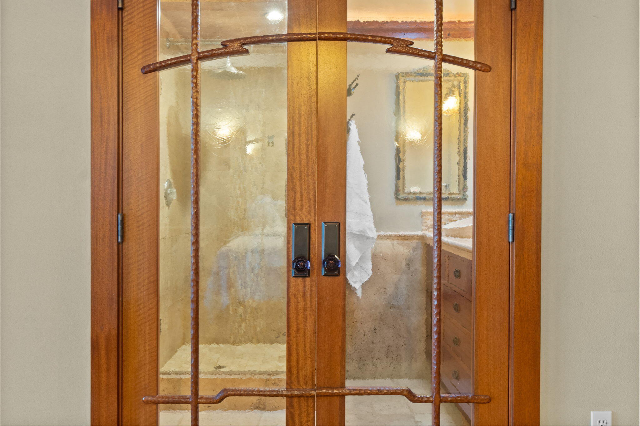 21925 Bear Creek Road Bend, OR 97702 - Photo 39 of 104 a bathroom with a shower and a glass door