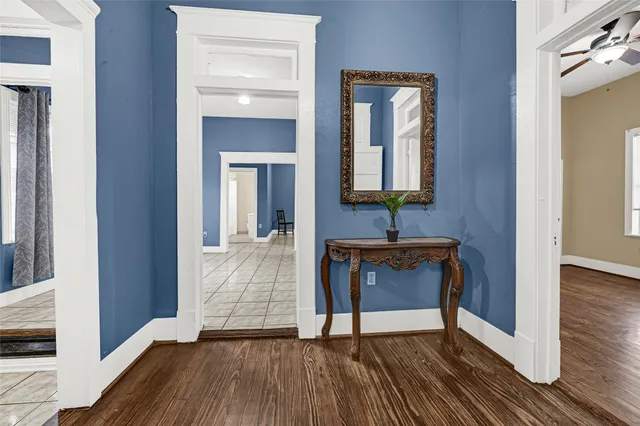 a view of an entryway with wooden floor