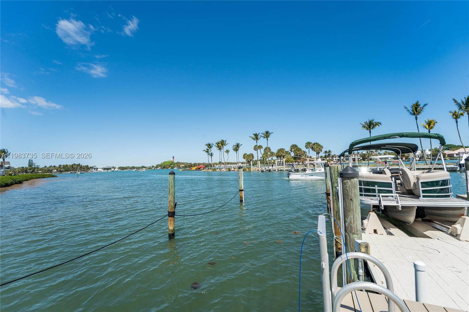 851 Saturn Street, Unit D Jupiter, FL 33477 - Photo 58 of 60 a view of a lake