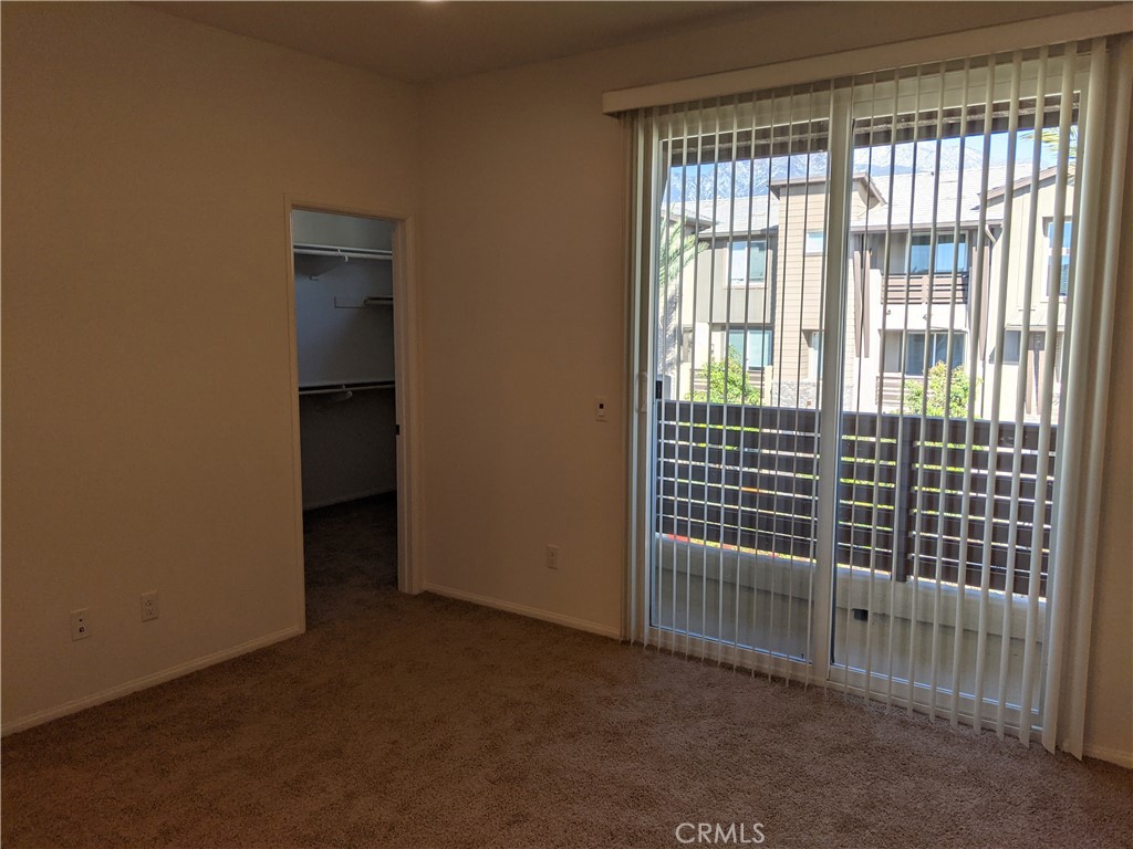 12248 Estrella Drive Rancho Cucamonga, CA 91739 - Photo 13 of 26 a view of empty room with floor to ceiling window