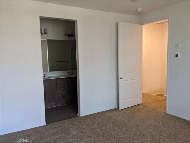 a view of balcony with furniture