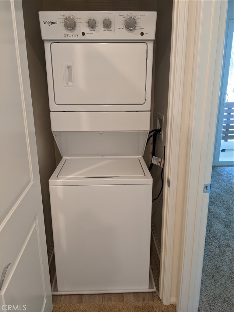 12248 Estrella Drive Rancho Cucamonga, CA 91739 - Photo 19 of 26 a close up view of washer and dryer