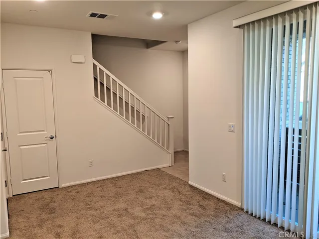 a view of an entryway with stairs