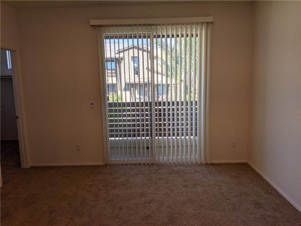 12248 Estrella Drive Rancho Cucamonga, CA 91739 - Photo 8 of 26 a view of an empty room with a window