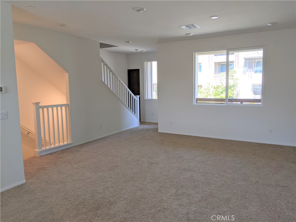 12248 Estrella Drive Rancho Cucamonga, CA 91739 - Photo 10 of 26 an empty room with windows