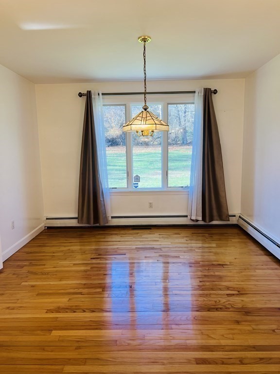 23 Case Drive Little Compton, RI 02837 - Photo 13 of 24 a view of a room with wooden floor and window