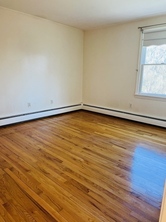 23 Case Drive Little Compton, RI 02837 - Photo 19 of 24 wooden floor in an empty room