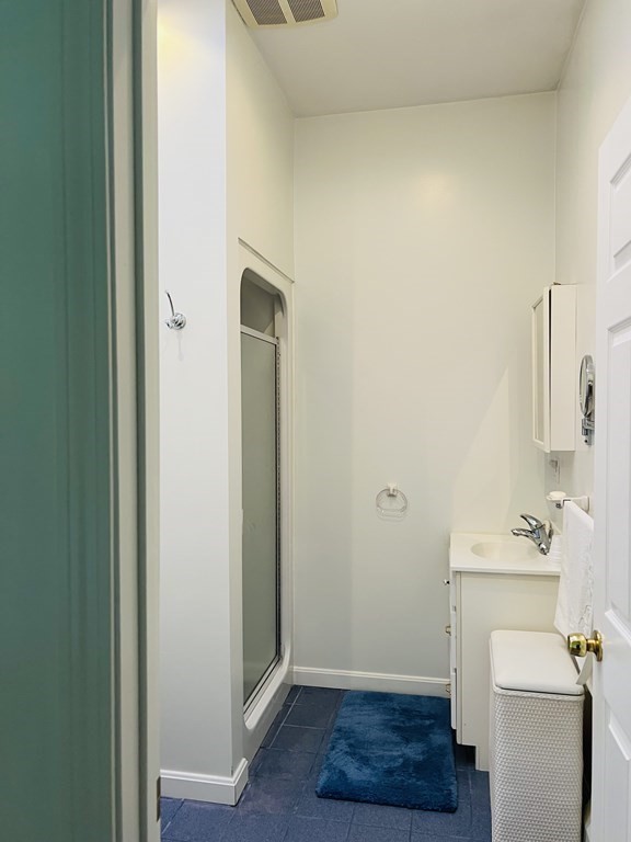 23 Case Drive Little Compton, RI 02837 - Photo 23 of 24 a bathroom with a sink and a mirror