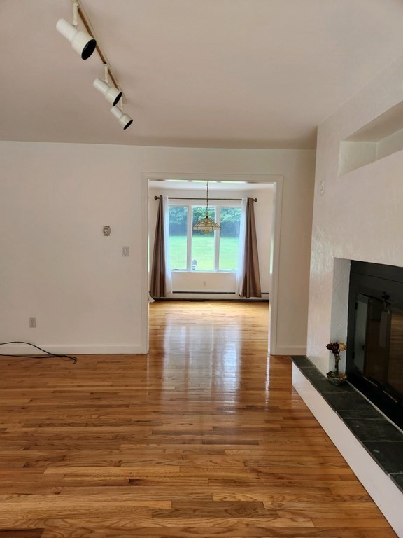 23 Case Drive Little Compton, RI 02837 - Photo 9 of 24 a view of livingroom with hardwood floor