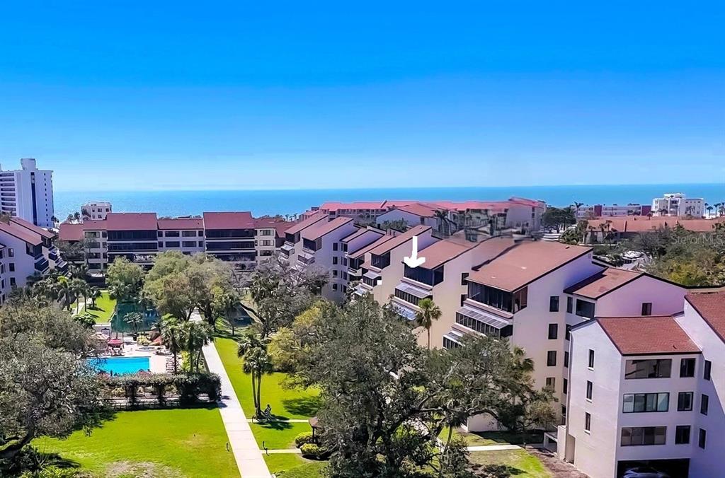 6285 Midnight Pass Road, Unit 403 Sarasota, FL 34242 - Photo 2 of 51 a view of a city with tall buildings