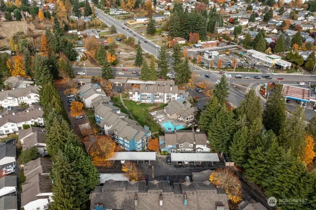 an aerial view of a house with outdoor space